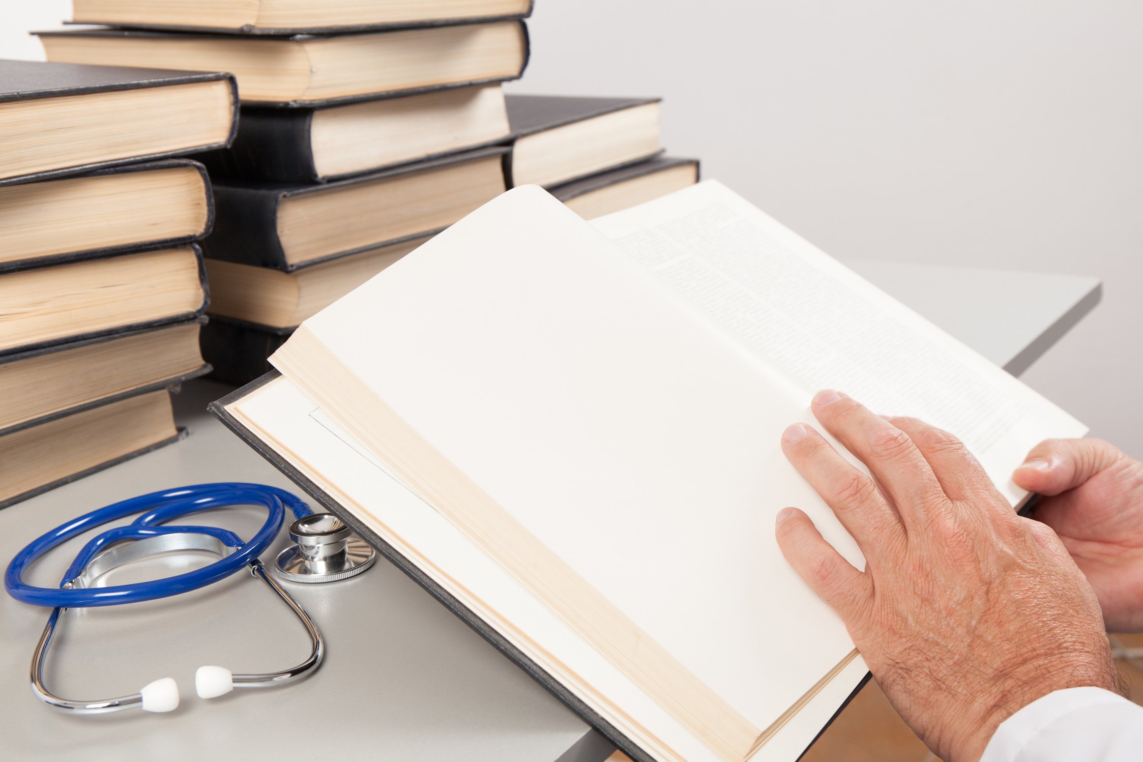 Doctor Reading Medical Books