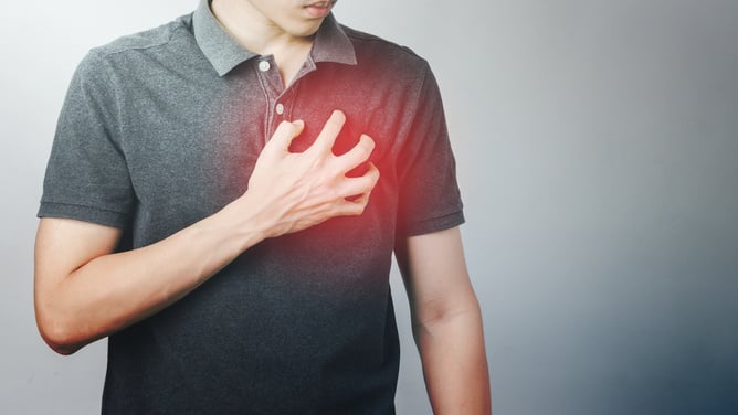 Man Has Chest Pain Suffering by Heart Disease, Cardiovascular Disease, Heart Attack. Health Care Concept