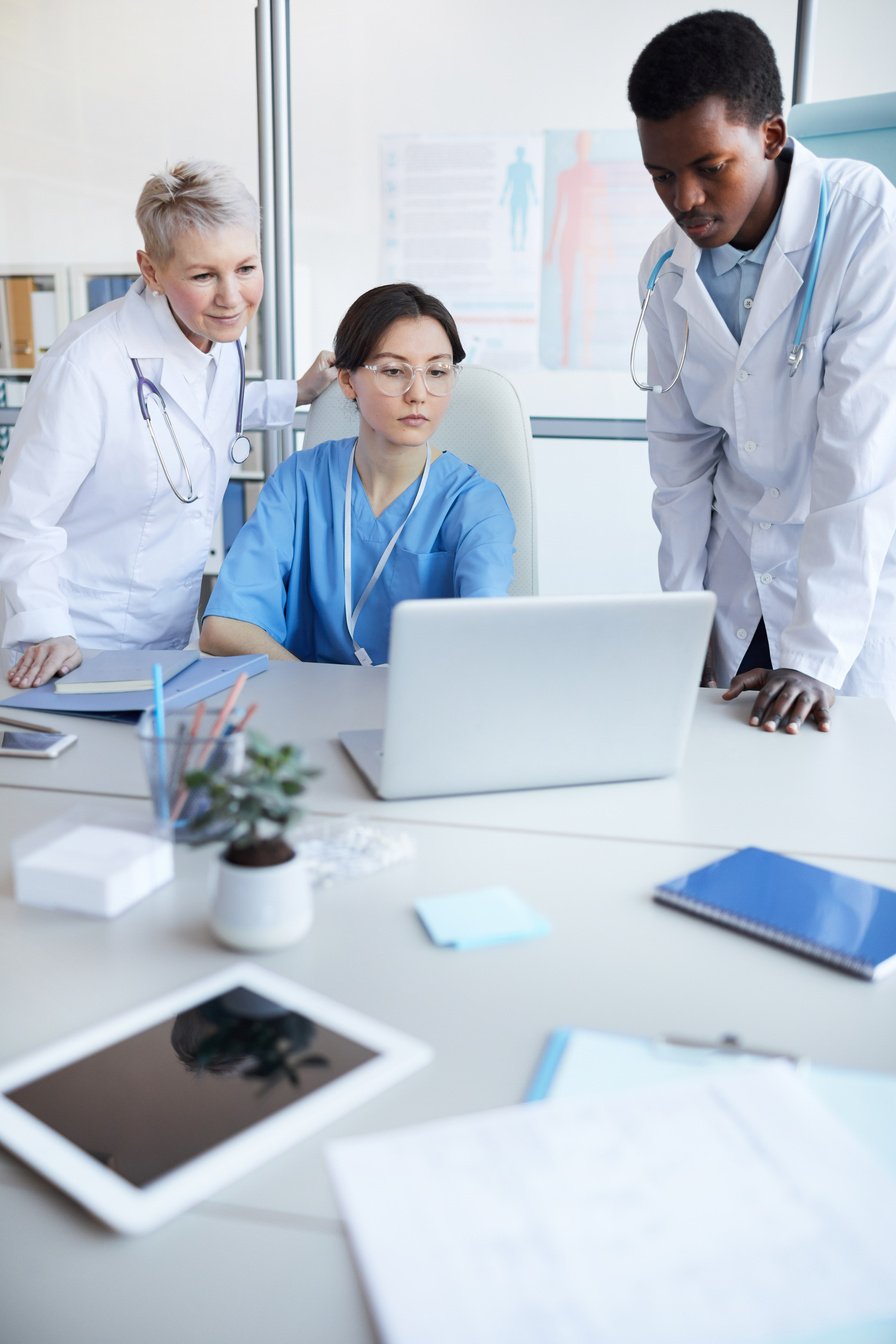 Doctors Using Computer in Clinic